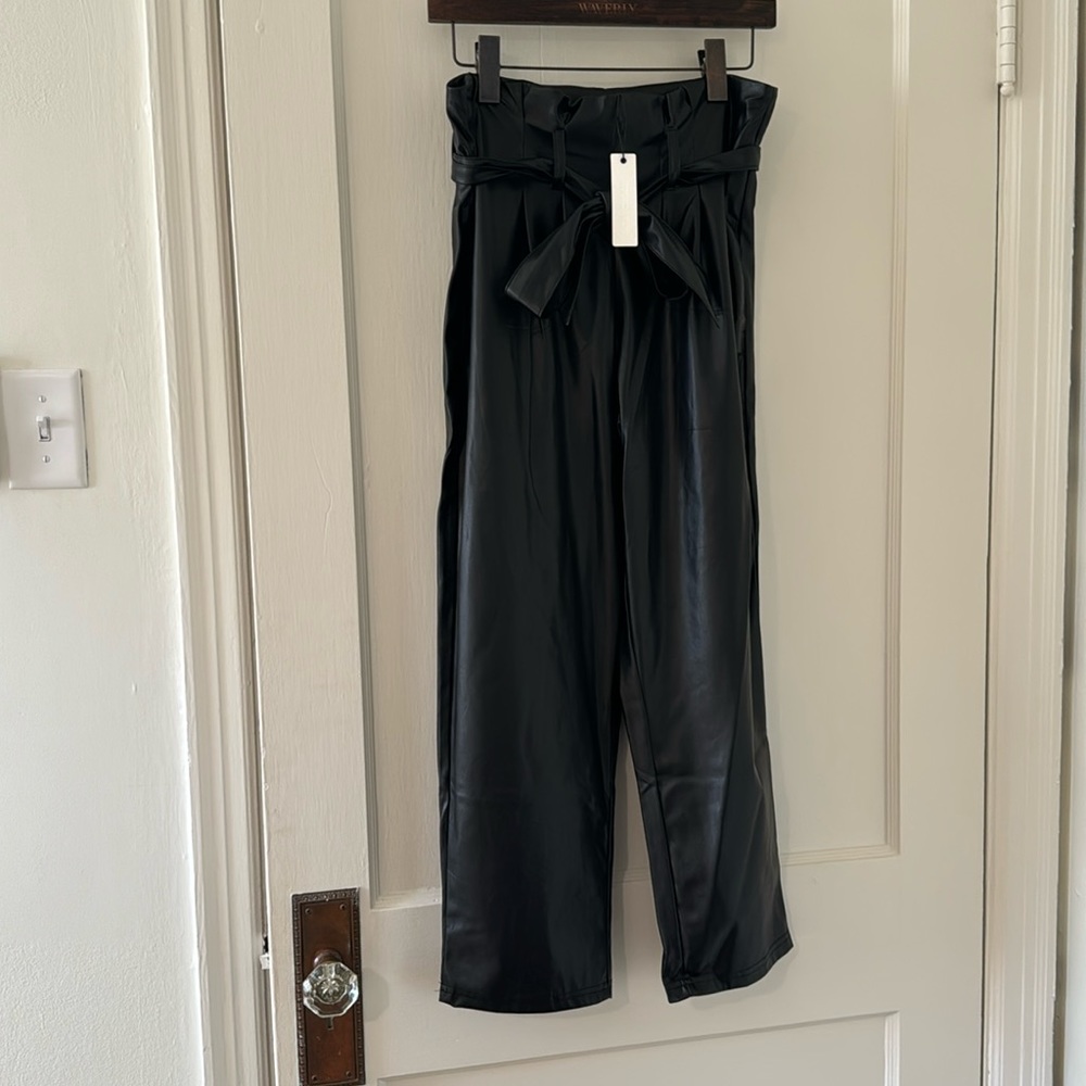Belted, black faux leather pants